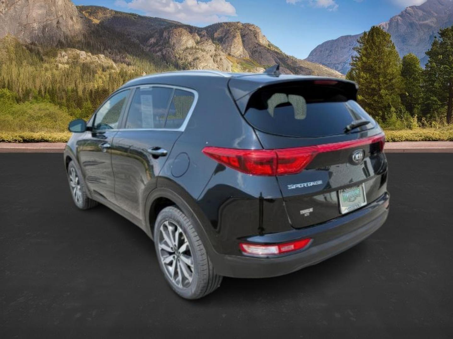 2019 BLACK /Black KIA Sportage (KNDPNCAC0K7) with an Theta II 24L I-4 gasoline direct injection engine, Automatic transmission, located at 1175 N Woodruff Ave, Idaho Falls, ID, 83401, 43.506901, -111.999657 - At Timberline Auto, finding a great deal on your next vehicle is always easy! Our experienced sales staff's goal is to help find you the right vehicle at the right price! Our knowledgeable finance department has options for almost any credit score. We offer extended service contract options to prote - Photo#2