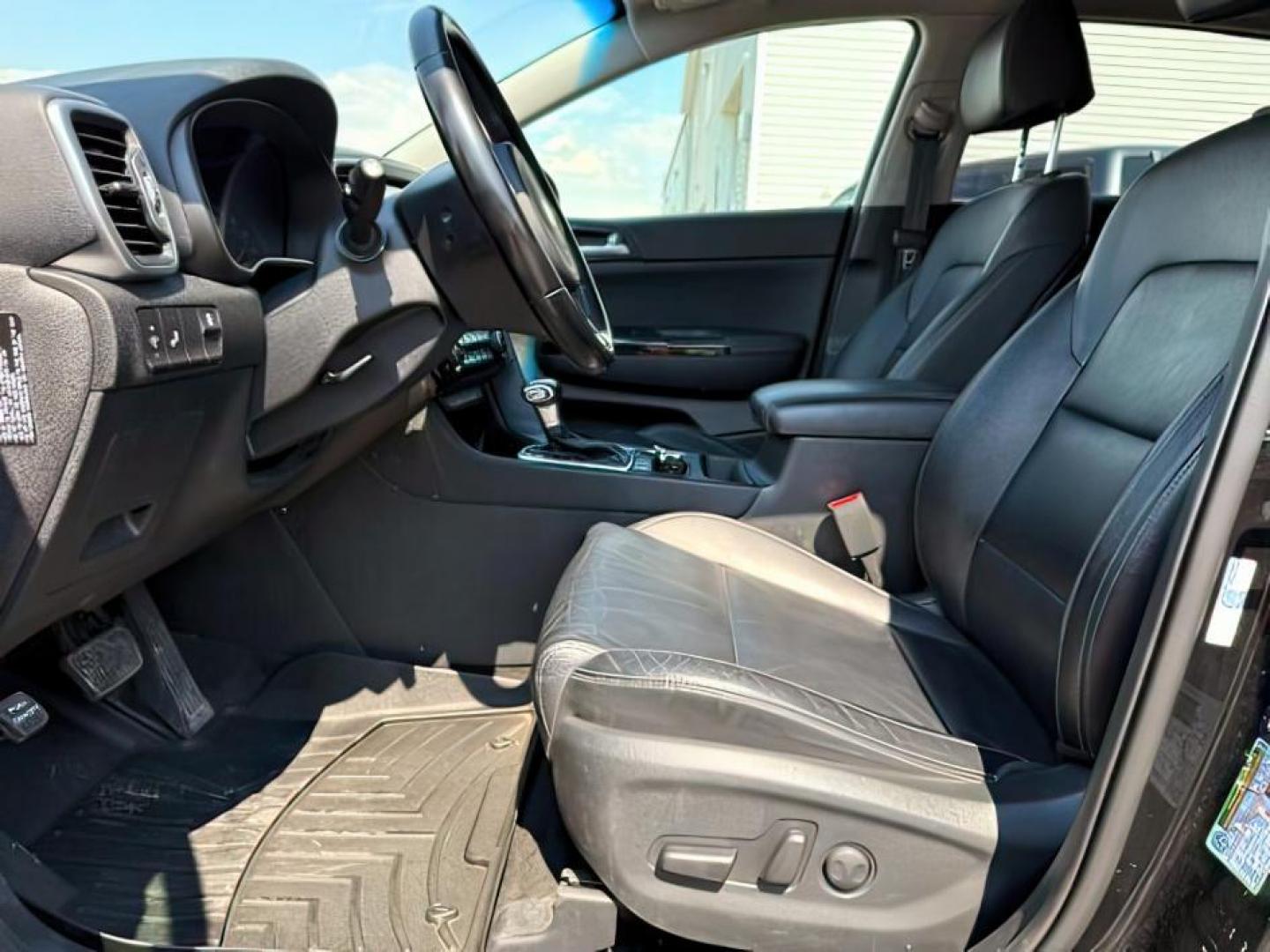 2019 BLACK /Black KIA Sportage (KNDPNCAC0K7) with an Theta II 24L I-4 gasoline direct injection engine, Automatic transmission, located at 1175 N Woodruff Ave, Idaho Falls, ID, 83401, 43.506901, -111.999657 - At Timberline Auto, finding a great deal on your next vehicle is always easy! Our experienced sales staff's goal is to help find you the right vehicle at the right price! Our knowledgeable finance department has options for almost any credit score. We offer extended service contract options to prote - Photo#12