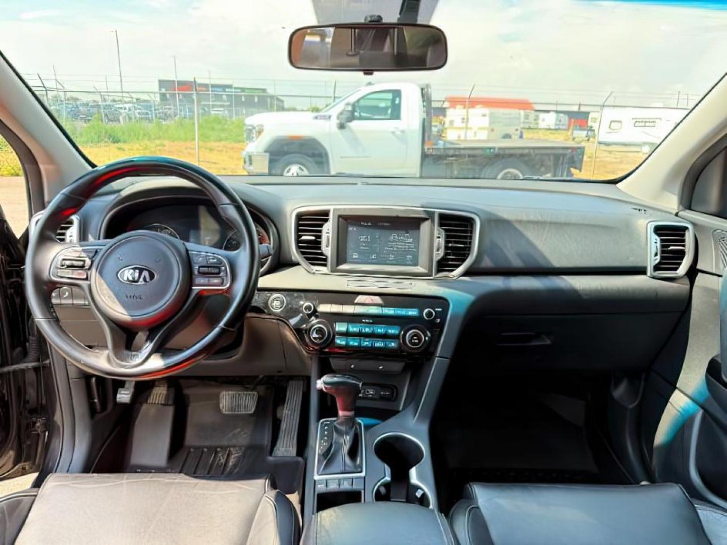 2019 BLACK /Black KIA Sportage (KNDPNCAC0K7) with an Theta II 24L I-4 gasoline direct injection engine, Automatic transmission, located at 1175 N Woodruff Ave, Idaho Falls, ID, 83401, 43.506901, -111.999657 - At Timberline Auto, finding a great deal on your next vehicle is always easy! Our experienced sales staff's goal is to help find you the right vehicle at the right price! Our knowledgeable finance department has options for almost any credit score. We offer extended service contract options to prote - Photo#22