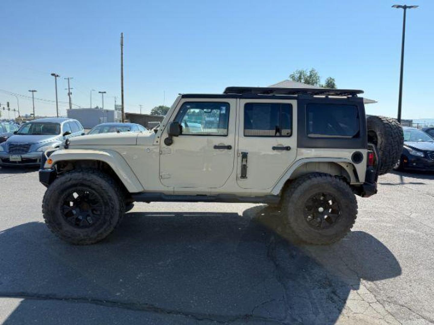 2012 TAN /CLOTH Jeep WRANGLER (1C4BJWEG2CL) with an 36 engine, Manual transmission, located at 1175 N Woodruff Ave, Idaho Falls, ID, 83401, 43.506901, -111.999657 - At Timberline Auto, finding a great deal on your next vehicle is always easy! Our experienced sales staff's goal is to help find you the right vehicle at the right price! Our knowledgeable finance department has options for almost any credit score. We offer extended service contract options to prote - Photo#21
