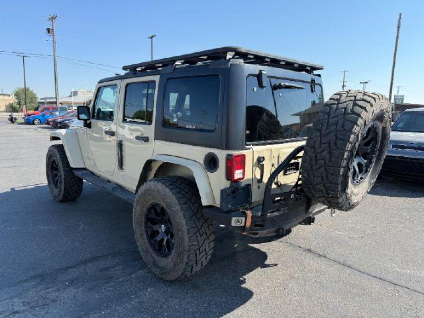 2012 TAN /CLOTH Jeep WRANGLER (1C4BJWEG2CL) with an 36 engine, Manual transmission, located at 1175 N Woodruff Ave, Idaho Falls, ID, 83401, 43.506901, -111.999657 - At Timberline Auto, finding a great deal on your next vehicle is always easy! Our experienced sales staff's goal is to help find you the right vehicle at the right price! Our knowledgeable finance department has options for almost any credit score. We offer extended service contract options to prote - Photo#22