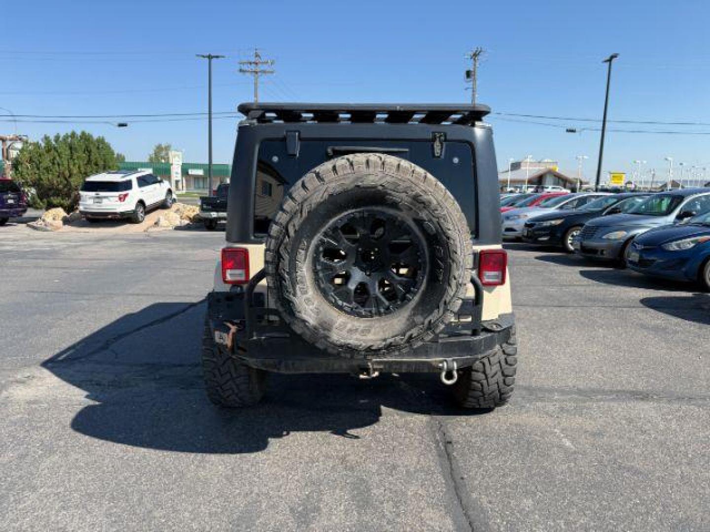 2012 TAN /CLOTH Jeep WRANGLER (1C4BJWEG2CL) with an 36 engine, Manual transmission, located at 1175 N Woodruff Ave, Idaho Falls, ID, 83401, 43.506901, -111.999657 - At Timberline Auto, finding a great deal on your next vehicle is always easy! Our experienced sales staff's goal is to help find you the right vehicle at the right price! Our knowledgeable finance department has options for almost any credit score. We offer extended service contract options to prote - Photo#23