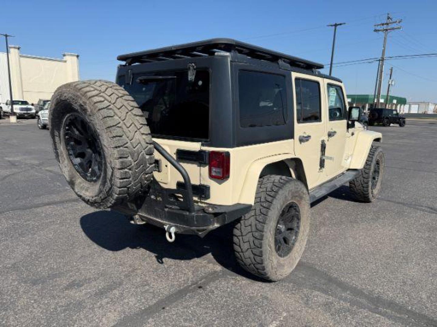 2012 TAN /CLOTH Jeep WRANGLER (1C4BJWEG2CL) with an 36 engine, Manual transmission, located at 1175 N Woodruff Ave, Idaho Falls, ID, 83401, 43.506901, -111.999657 - At Timberline Auto, finding a great deal on your next vehicle is always easy! Our experienced sales staff's goal is to help find you the right vehicle at the right price! Our knowledgeable finance department has options for almost any credit score. We offer extended service contract options to prote - Photo#24