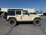 2012 TAN /CLOTH Jeep WRANGLER (1C4BJWEG2CL) with an 36 engine, Manual transmission, located at 1175 N Woodruff Ave, Idaho Falls, ID, 83401, 43.506901, -111.999657 - At Timberline Auto, finding a great deal on your next vehicle is always easy! Our experienced sales staff's goal is to help find you the right vehicle at the right price! Our knowledgeable finance department has options for almost any credit score. We offer extended service contract options to prote - Photo#25