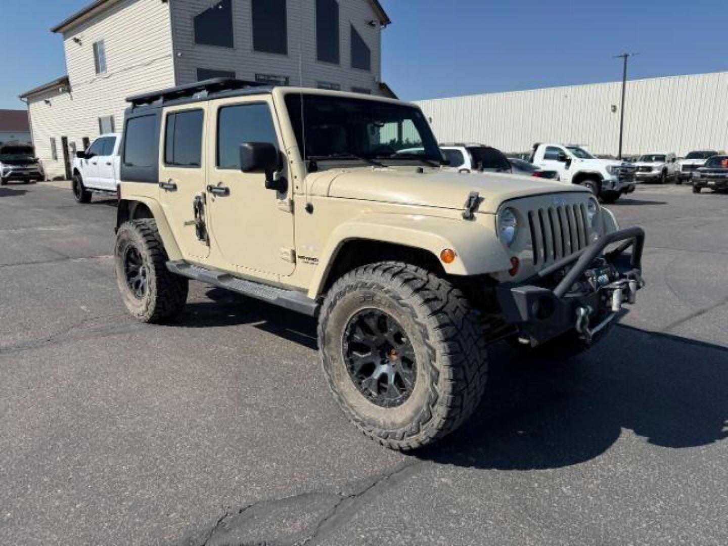 2012 TAN /CLOTH Jeep WRANGLER (1C4BJWEG2CL) with an 36 engine, Manual transmission, located at 1175 N Woodruff Ave, Idaho Falls, ID, 83401, 43.506901, -111.999657 - At Timberline Auto, finding a great deal on your next vehicle is always easy! Our experienced sales staff's goal is to help find you the right vehicle at the right price! Our knowledgeable finance department has options for almost any credit score. We offer extended service contract options to prote - Photo#26