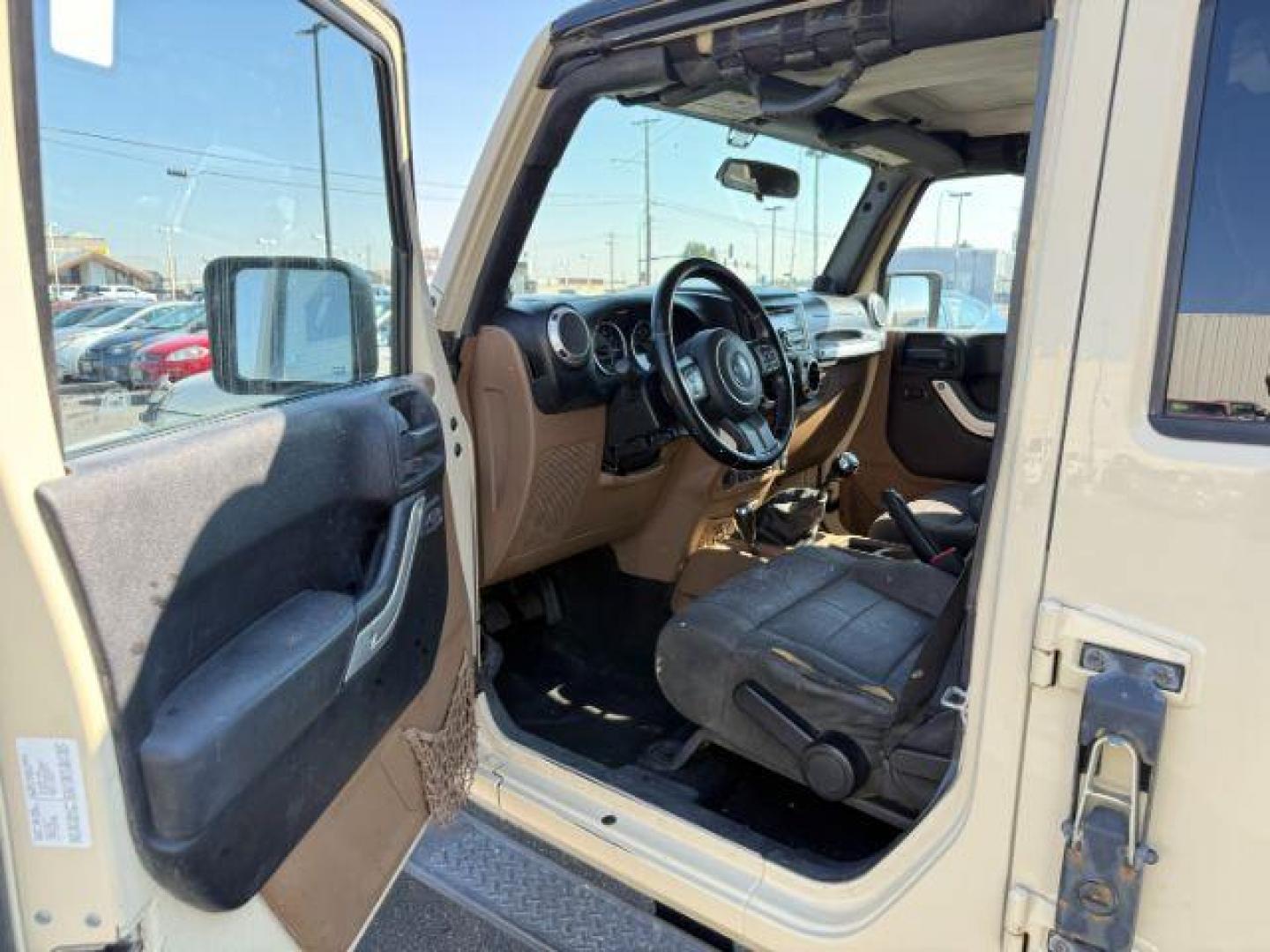 2012 TAN /CLOTH Jeep WRANGLER (1C4BJWEG2CL) with an 36 engine, Manual transmission, located at 1175 N Woodruff Ave, Idaho Falls, ID, 83401, 43.506901, -111.999657 - At Timberline Auto, finding a great deal on your next vehicle is always easy! Our experienced sales staff's goal is to help find you the right vehicle at the right price! Our knowledgeable finance department has options for almost any credit score. We offer extended service contract options to prote - Photo#30