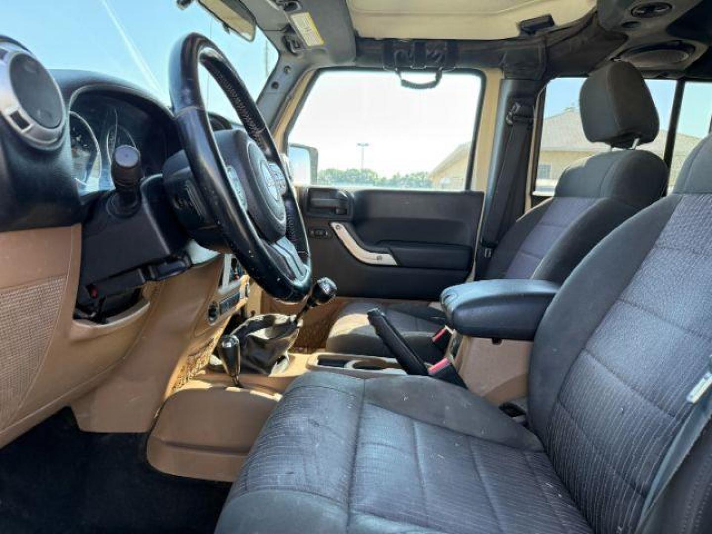 2012 TAN /CLOTH Jeep WRANGLER (1C4BJWEG2CL) with an 36 engine, Manual transmission, located at 1175 N Woodruff Ave, Idaho Falls, ID, 83401, 43.506901, -111.999657 - At Timberline Auto, finding a great deal on your next vehicle is always easy! Our experienced sales staff's goal is to help find you the right vehicle at the right price! Our knowledgeable finance department has options for almost any credit score. We offer extended service contract options to prote - Photo#31