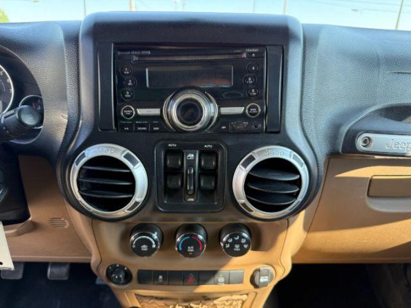 2012 TAN /CLOTH Jeep WRANGLER (1C4BJWEG2CL) with an 36 engine, Manual transmission, located at 1175 N Woodruff Ave, Idaho Falls, ID, 83401, 43.506901, -111.999657 - At Timberline Auto, finding a great deal on your next vehicle is always easy! Our experienced sales staff's goal is to help find you the right vehicle at the right price! Our knowledgeable finance department has options for almost any credit score. We offer extended service contract options to prote - Photo#34