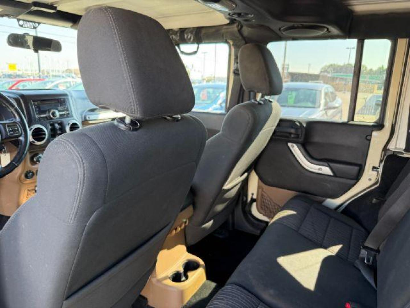 2012 TAN /CLOTH Jeep WRANGLER (1C4BJWEG2CL) with an 36 engine, Manual transmission, located at 1175 N Woodruff Ave, Idaho Falls, ID, 83401, 43.506901, -111.999657 - At Timberline Auto, finding a great deal on your next vehicle is always easy! Our experienced sales staff's goal is to help find you the right vehicle at the right price! Our knowledgeable finance department has options for almost any credit score. We offer extended service contract options to prote - Photo#38