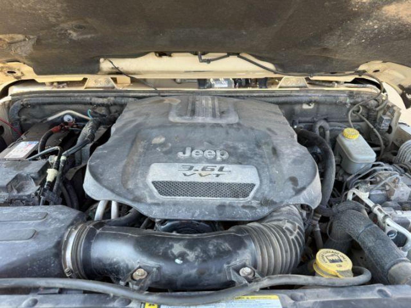 2012 TAN /CLOTH Jeep WRANGLER (1C4BJWEG2CL) with an 36 engine, Manual transmission, located at 1175 N Woodruff Ave, Idaho Falls, ID, 83401, 43.506901, -111.999657 - At Timberline Auto, finding a great deal on your next vehicle is always easy! Our experienced sales staff's goal is to help find you the right vehicle at the right price! Our knowledgeable finance department has options for almost any credit score. We offer extended service contract options to prote - Photo#39