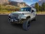2012 TAN /CLOTH Jeep WRANGLER (1C4BJWEG2CL) with an 36 engine, Manual transmission, located at 1175 N Woodruff Ave, Idaho Falls, ID, 83401, 43.506901, -111.999657 - At Timberline Auto, finding a great deal on your next vehicle is always easy! Our experienced sales staff's goal is to help find you the right vehicle at the right price! Our knowledgeable finance department has options for almost any credit score. We offer extended service contract options to prote - Photo#0