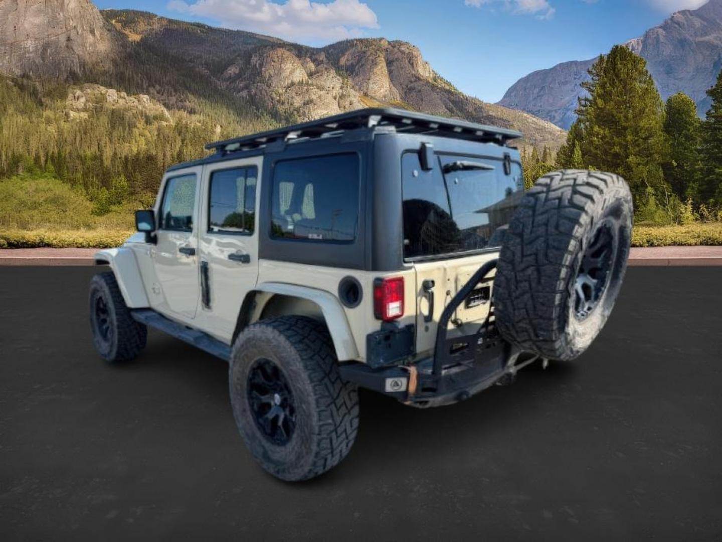 2012 TAN /CLOTH Jeep WRANGLER (1C4BJWEG2CL) with an 36 engine, Manual transmission, located at 1175 N Woodruff Ave, Idaho Falls, ID, 83401, 43.506901, -111.999657 - At Timberline Auto, finding a great deal on your next vehicle is always easy! Our experienced sales staff's goal is to help find you the right vehicle at the right price! Our knowledgeable finance department has options for almost any credit score. We offer extended service contract options to prote - Photo#2