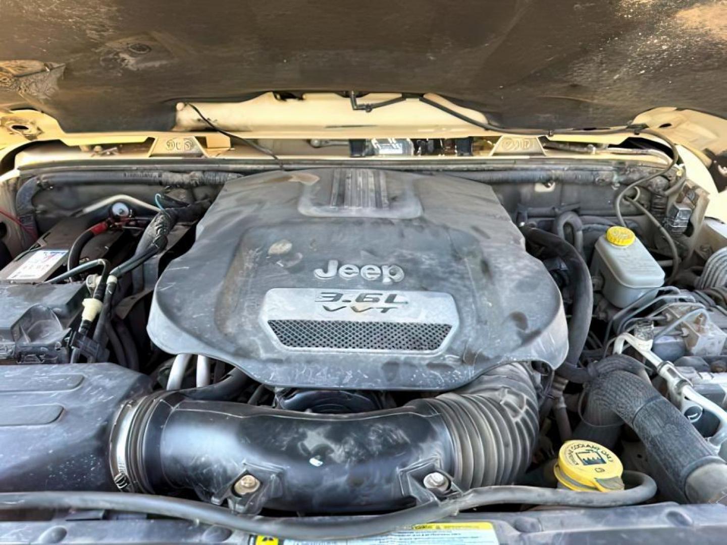 2012 TAN /CLOTH Jeep WRANGLER (1C4BJWEG2CL) with an 36 engine, Manual transmission, located at 1175 N Woodruff Ave, Idaho Falls, ID, 83401, 43.506901, -111.999657 - At Timberline Auto, finding a great deal on your next vehicle is always easy! Our experienced sales staff's goal is to help find you the right vehicle at the right price! Our knowledgeable finance department has options for almost any credit score. We offer extended service contract options to prote - Photo#19