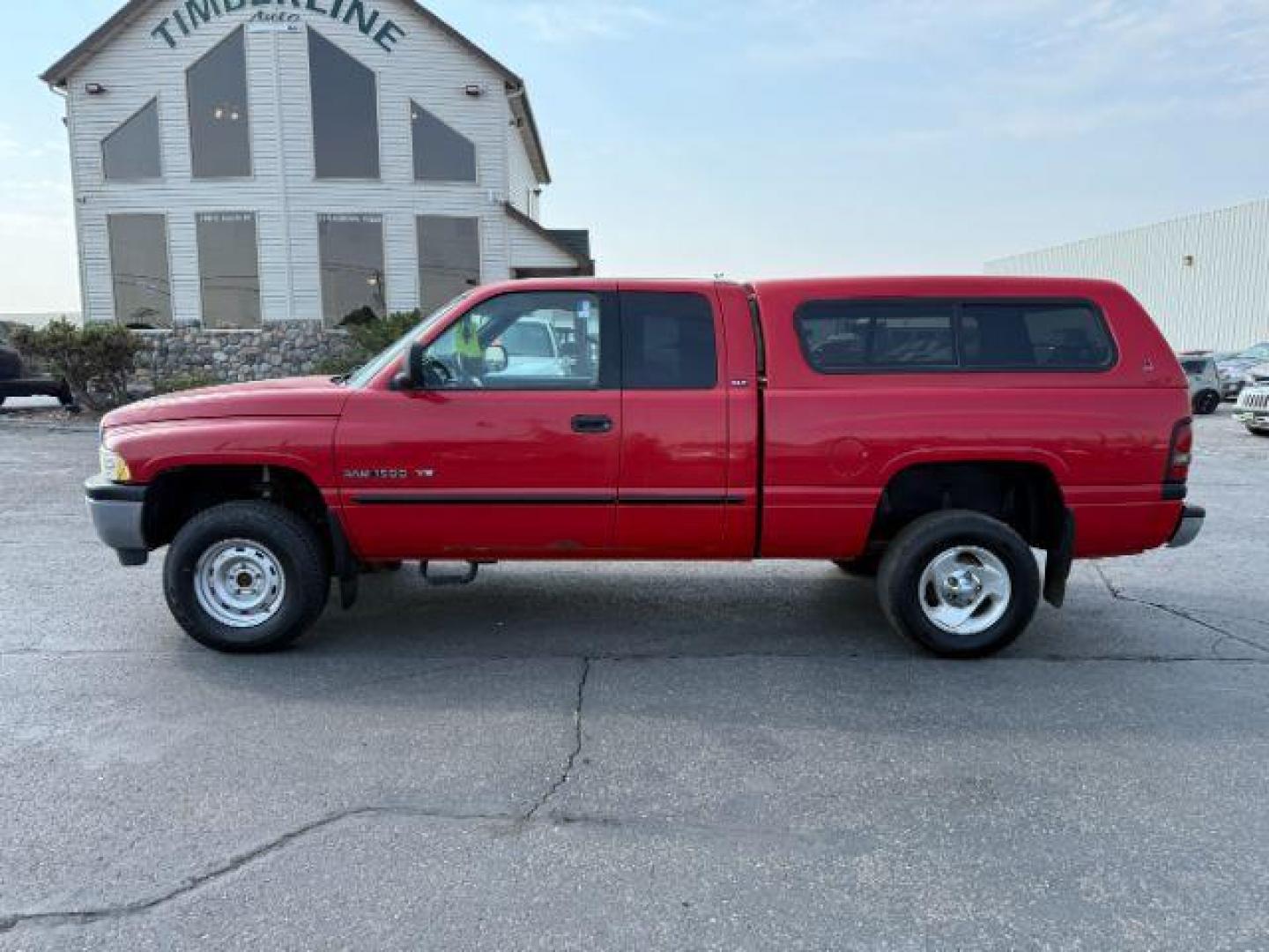 2001 RED /Mist Gray Cloth Dodge Ram 1500 (3B7HF13Y81G) with an 52L V8 OHV 16V engine, Automatic transmission, located at 1175 N Woodruff Ave, Idaho Falls, ID, 83401, 43.506901, -111.999657 - At Timberline Auto, finding a great deal on your next vehicle is always easy! Our experienced sales staff's goal is to help find you the right vehicle at the right price! Our knowledgeable finance department has options for almost any credit score. We offer extended service contract options to prote - Photo#1