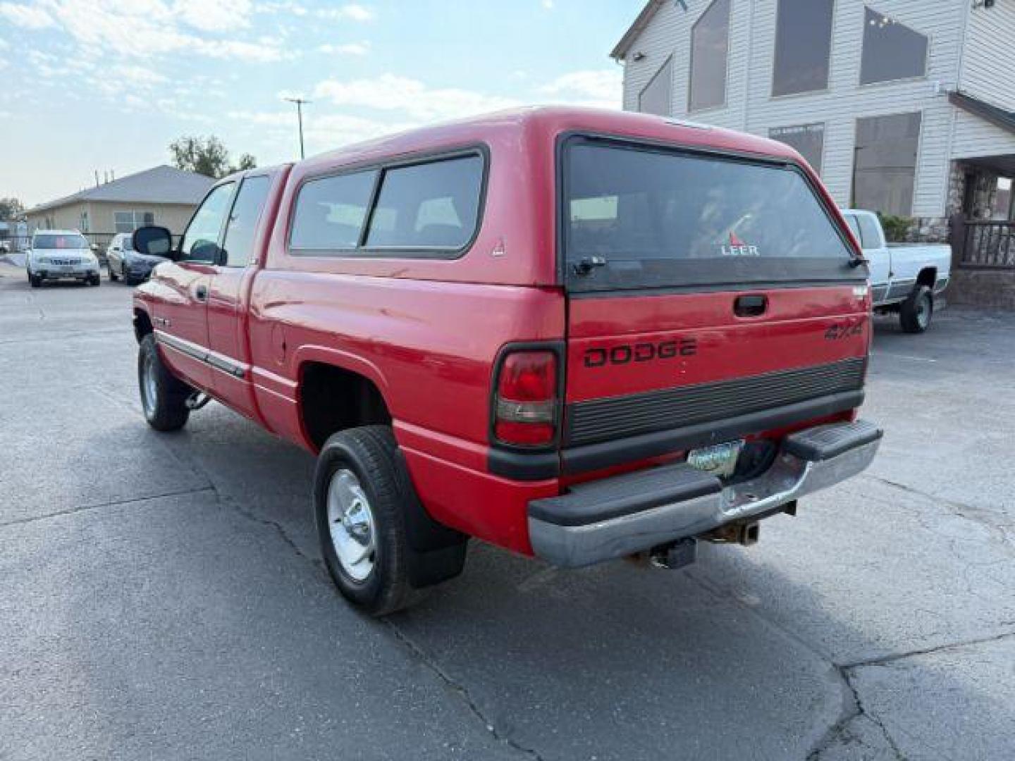2001 RED /Mist Gray Cloth Dodge Ram 1500 (3B7HF13Y81G) with an 52L V8 OHV 16V engine, Automatic transmission, located at 1175 N Woodruff Ave, Idaho Falls, ID, 83401, 43.506901, -111.999657 - At Timberline Auto, finding a great deal on your next vehicle is always easy! Our experienced sales staff's goal is to help find you the right vehicle at the right price! Our knowledgeable finance department has options for almost any credit score. We offer extended service contract options to prote - Photo#2