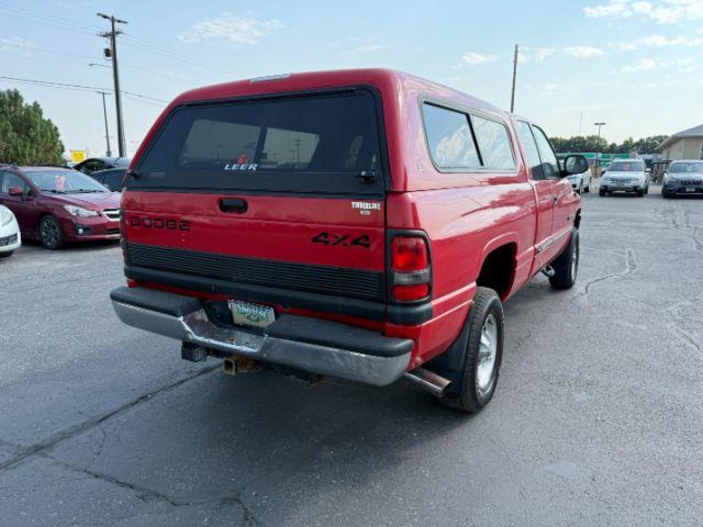 2001 RED /Mist Gray Cloth Dodge Ram 1500 (3B7HF13Y81G) with an 52L V8 OHV 16V engine, Automatic transmission, located at 1175 N Woodruff Ave, Idaho Falls, ID, 83401, 43.506901, -111.999657 - At Timberline Auto, finding a great deal on your next vehicle is always easy! Our experienced sales staff's goal is to help find you the right vehicle at the right price! Our knowledgeable finance department has options for almost any credit score. We offer extended service contract options to prote - Photo#4