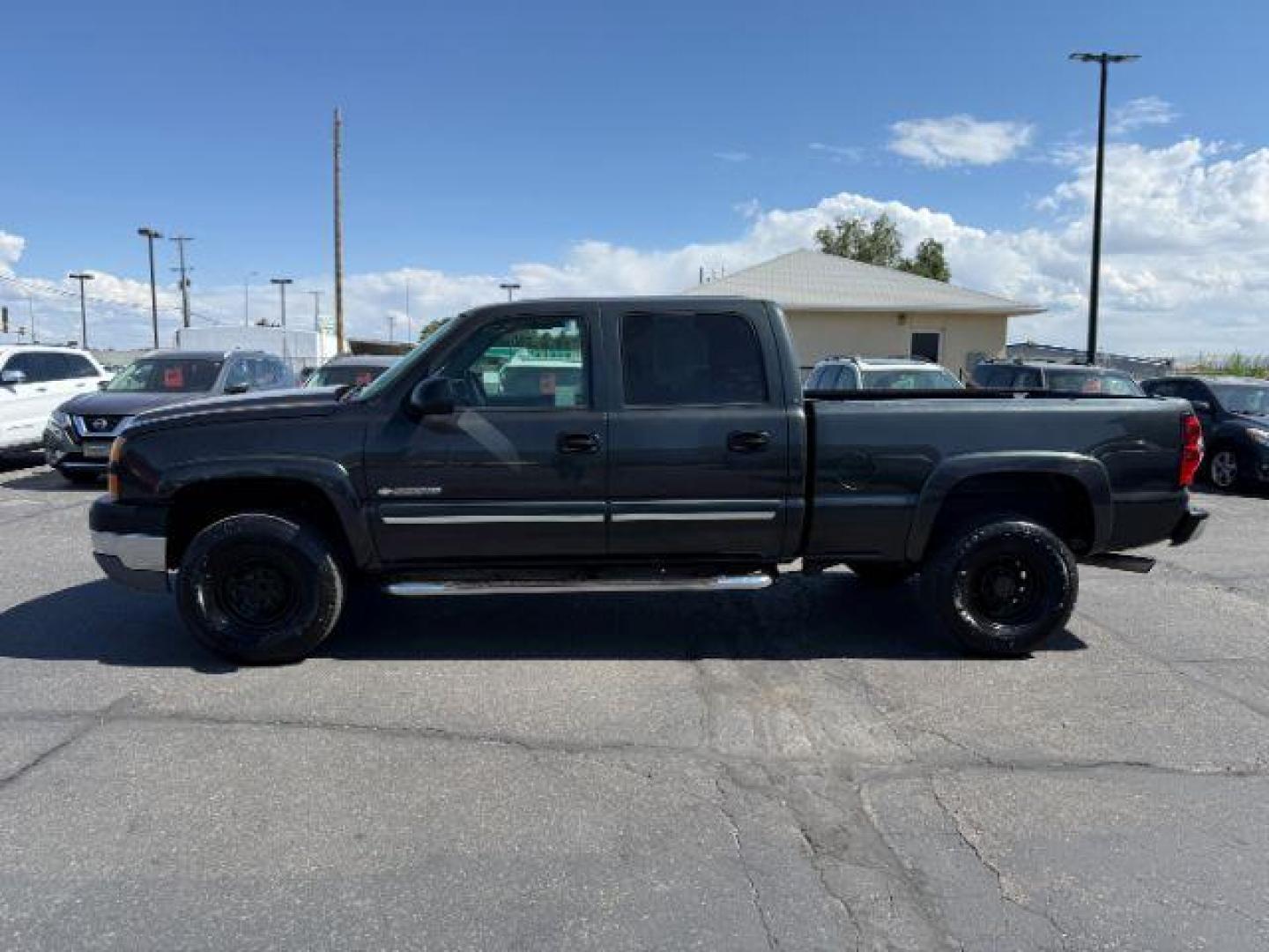 2005 Black /Dark Charcoal Chevrolet Silverado 2500HD (1GCHC23U55F) with an Vortec 6L V-8 regular unleaded engine, Automatic transmission, located at 1175 N Woodruff Ave, Idaho Falls, ID, 83401, 43.506901, -111.999657 - At Timberline Auto, finding a great deal on your next vehicle is always easy! Our experienced sales staff's goal is to help find you the right vehicle at the right price! Our knowledgeable finance department has options for almost any credit score. We offer extended service contract options to prote - Photo#20