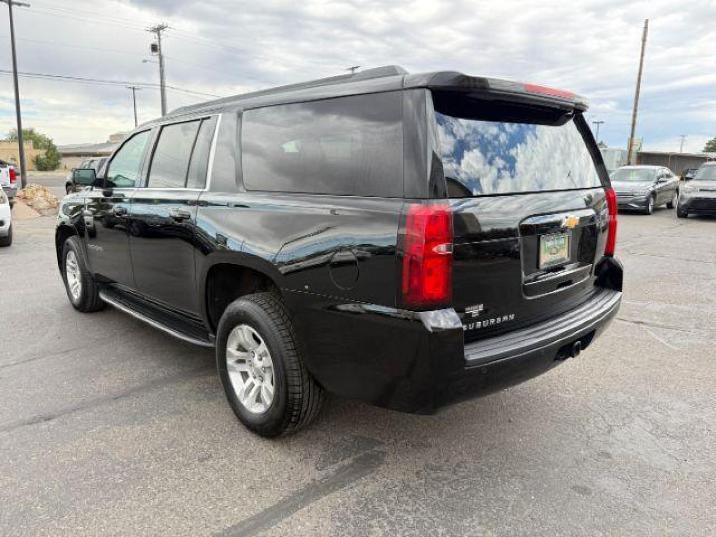 2018 Black /Jet Black Chevrolet Suburban LS (1GNSKGKC5JR) with an EcoTec3 5.3L V-8 gasoline direct injection engine, AUTOMATIC transmission, located at 1235 N Woodruff Ave., Idaho Falls, 83401, (208) 523-1053, 43.507172, -112.000488 - At Timberline Auto, finding a great deal on your next vehicle is always easy! Our experienced sales staff's goal is to help find you the right vehicle at the right price! Our knowledgeable finance department has options for almost any credit score. We offer extended service contract options to prote - Photo#2