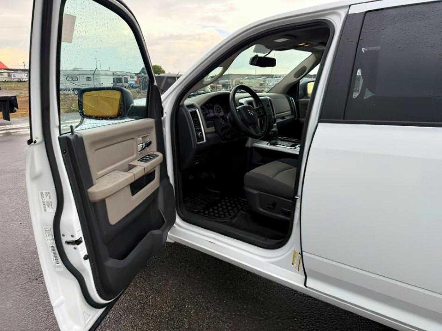2012 WHITE /CLOTH Ram 1500 (1C6RD7LT5CS) with an 57 engine, Automatic transmission, located at 1175 N Woodruff Ave, Idaho Falls, ID, 83401, 43.506901, -111.999657 - At Timberline Auto, finding a great deal on your next vehicle is always easy! Our experienced sales staff's goal is to help find you the right vehicle at the right price! Our knowledgeable finance department has options for almost any credit score. We offer extended service contract options to prote - Photo#9