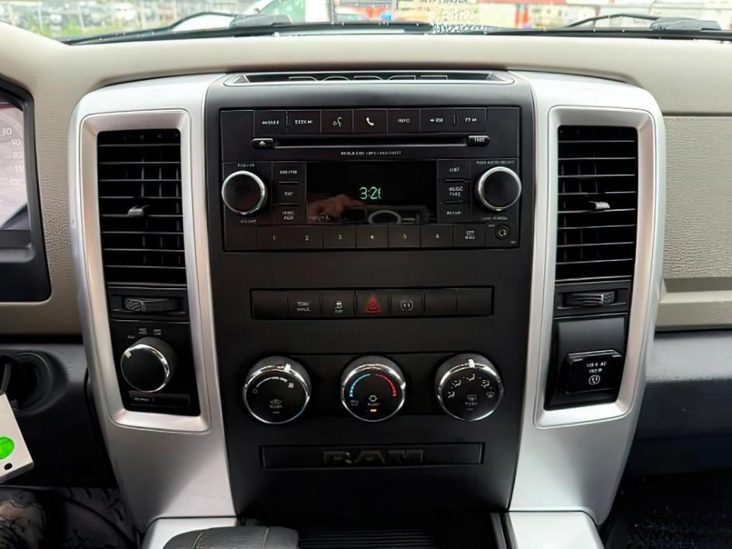 2012 WHITE /CLOTH Ram 1500 (1C6RD7LT5CS) with an 57 engine, Automatic transmission, located at 1175 N Woodruff Ave, Idaho Falls, ID, 83401, 43.506901, -111.999657 - At Timberline Auto, finding a great deal on your next vehicle is always easy! Our experienced sales staff's goal is to help find you the right vehicle at the right price! Our knowledgeable finance department has options for almost any credit score. We offer extended service contract options to prote - Photo#13