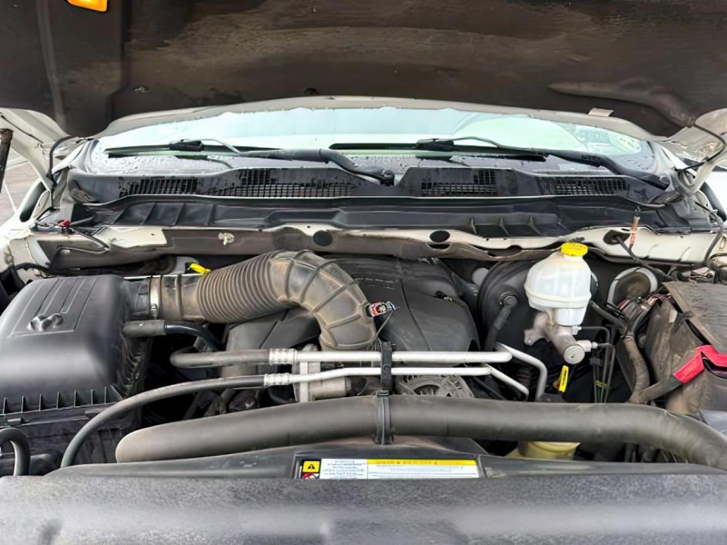 2012 WHITE /CLOTH Ram 1500 (1C6RD7LT5CS) with an 57 engine, Automatic transmission, located at 1175 N Woodruff Ave, Idaho Falls, ID, 83401, 43.506901, -111.999657 - At Timberline Auto, finding a great deal on your next vehicle is always easy! Our experienced sales staff's goal is to help find you the right vehicle at the right price! Our knowledgeable finance department has options for almost any credit score. We offer extended service contract options to prote - Photo#19