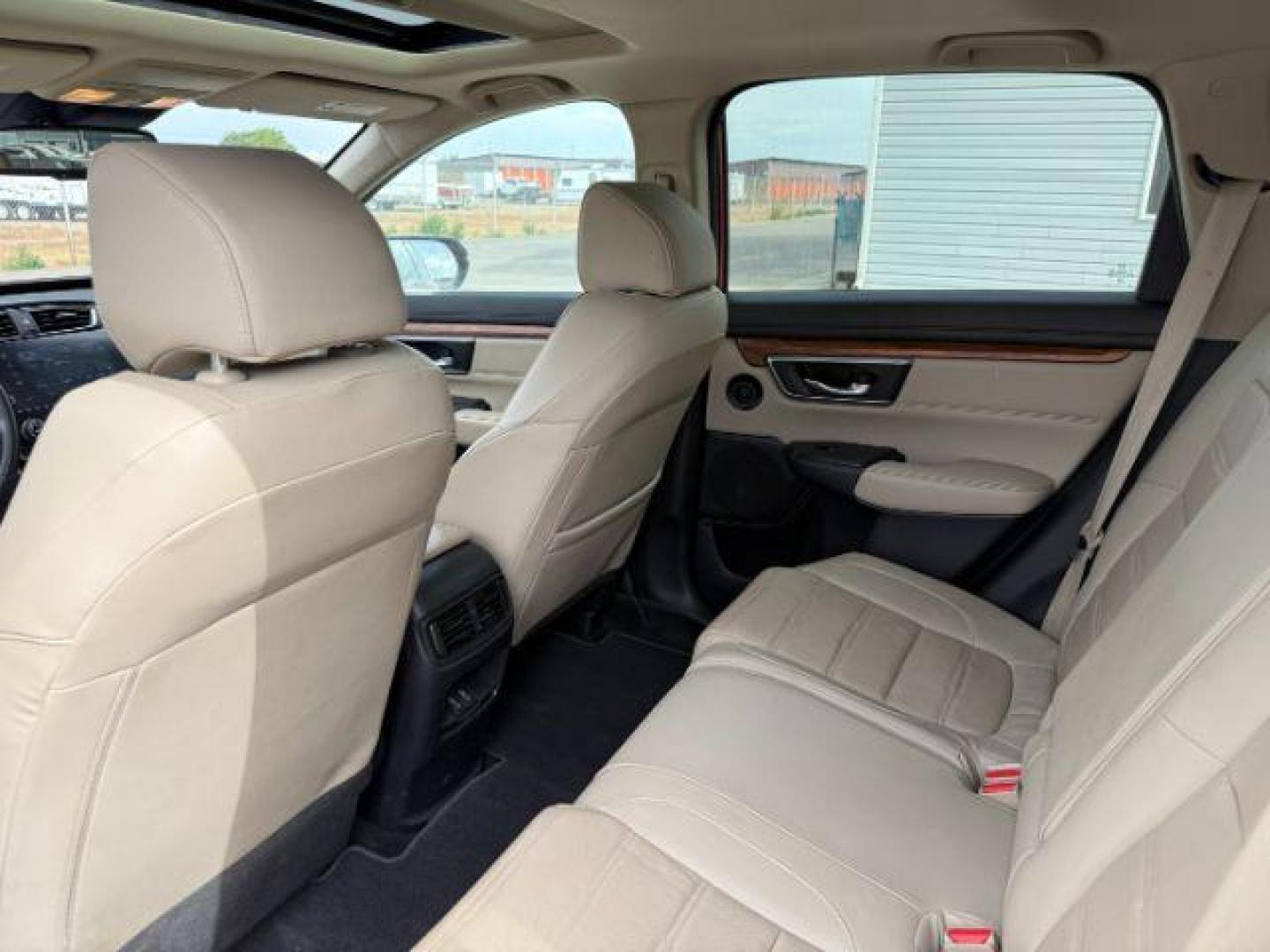 2017 Basque Red Pearl II /Ivory Honda CR-V (5J6RW2H83HL) with an 15L I-4 gasoline direct injection engine, Automatic transmission, located at 1175 N Woodruff Ave, Idaho Falls, ID, 83401, 43.506901, -111.999657 - At Timberline Auto, finding a great deal on your next vehicle is always easy! Our experienced sales staff's goal is to help find you the right vehicle at the right price! Our knowledgeable finance department has options for almost any credit score. We offer extended service contract options to prote - Photo#40