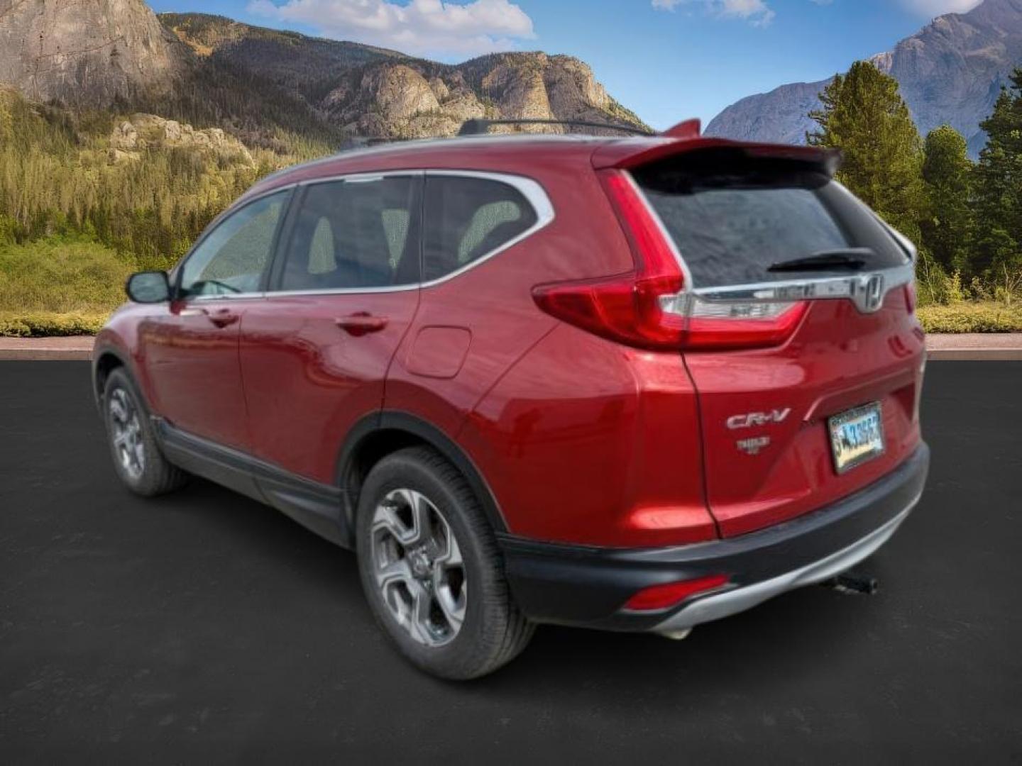 2017 Basque Red Pearl II /Ivory Honda CR-V (5J6RW2H83HL) with an 15L I-4 gasoline direct injection engine, Automatic transmission, located at 1175 N Woodruff Ave, Idaho Falls, ID, 83401, 43.506901, -111.999657 - At Timberline Auto, finding a great deal on your next vehicle is always easy! Our experienced sales staff's goal is to help find you the right vehicle at the right price! Our knowledgeable finance department has options for almost any credit score. We offer extended service contract options to prote - Photo#2