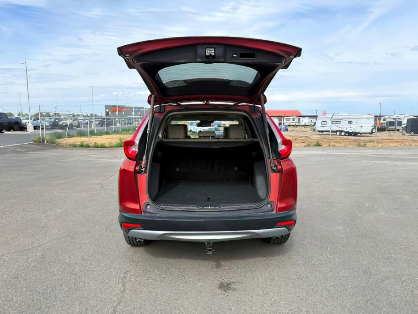 2017 Basque Red Pearl II /Ivory Honda CR-V (5J6RW2H83HL) with an 15L I-4 gasoline direct injection engine, Automatic transmission, located at 1175 N Woodruff Ave, Idaho Falls, ID, 83401, 43.506901, -111.999657 - At Timberline Auto, finding a great deal on your next vehicle is always easy! Our experienced sales staff's goal is to help find you the right vehicle at the right price! Our knowledgeable finance department has options for almost any credit score. We offer extended service contract options to prote - Photo#4