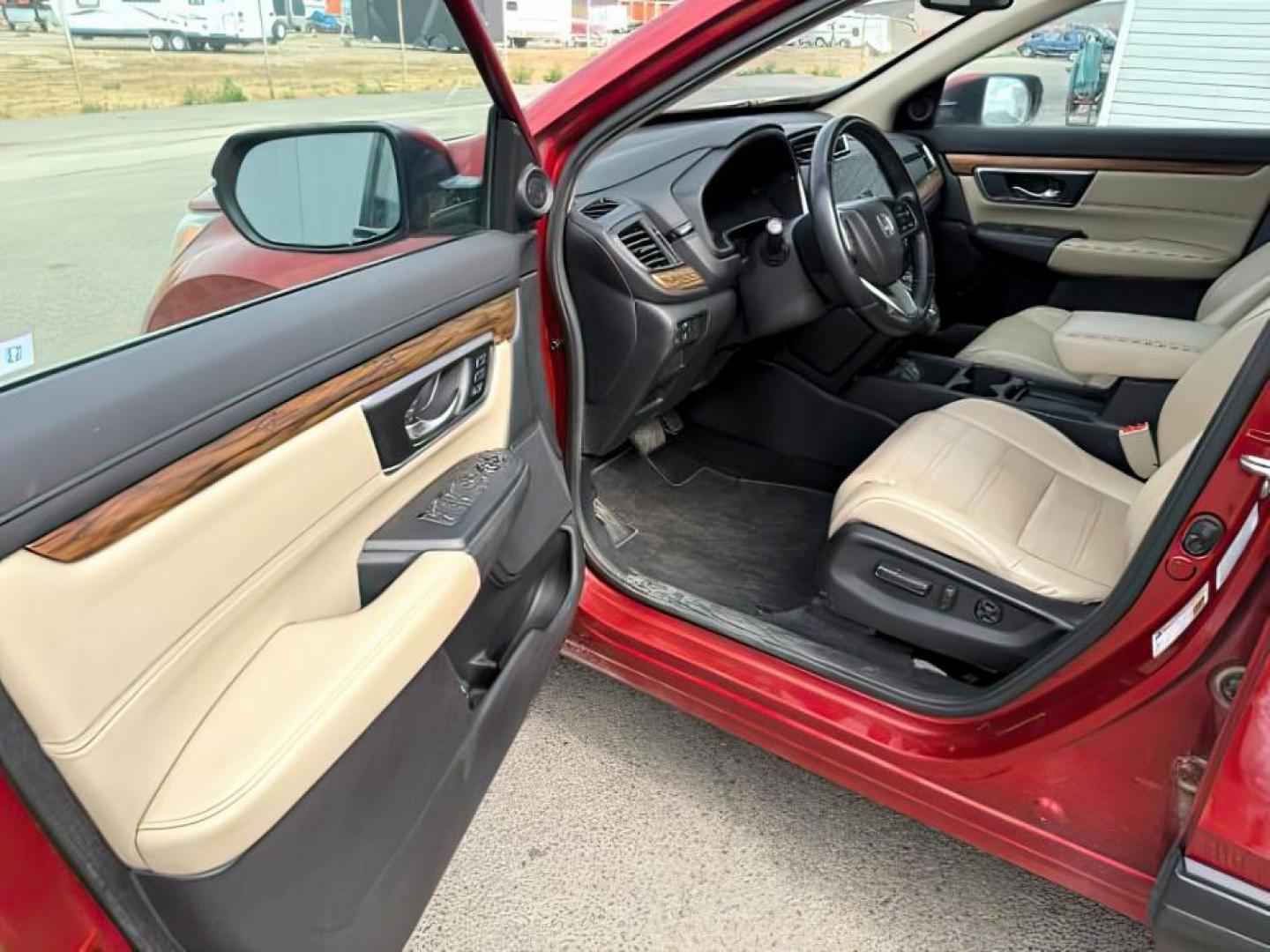 2017 Basque Red Pearl II /Ivory Honda CR-V (5J6RW2H83HL) with an 15L I-4 gasoline direct injection engine, Automatic transmission, located at 1175 N Woodruff Ave, Idaho Falls, ID, 83401, 43.506901, -111.999657 - At Timberline Auto, finding a great deal on your next vehicle is always easy! Our experienced sales staff's goal is to help find you the right vehicle at the right price! Our knowledgeable finance department has options for almost any credit score. We offer extended service contract options to prote - Photo#11