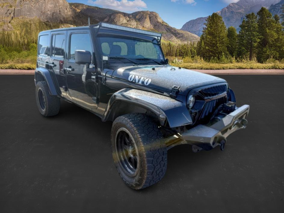 photo of 2013 Jeep Wrangler Unlimited SAHARA