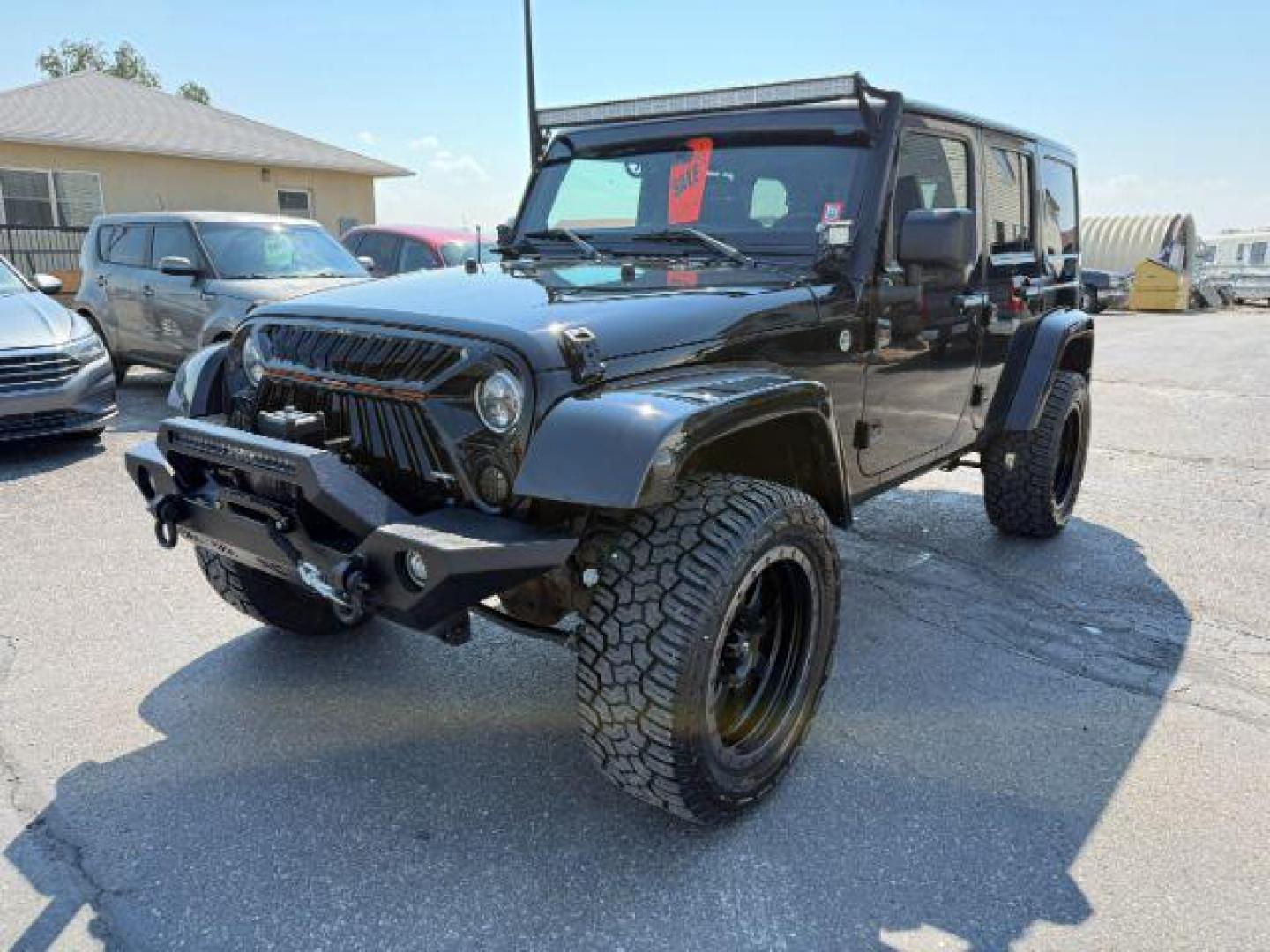 2013 BLACK /CLOTH Jeep Wrangler Unlimited (1C4HJWEG7DL) with an V6 engine, Automatic transmission, located at 1175 N Woodruff Ave, Idaho Falls, ID, 83401, 43.506901, -111.999657 - At Timberline Auto, finding a great deal on your next vehicle is always easy! Our experienced sales staff's goal is to help find you the right vehicle at the right price! Our knowledgeable finance department has options for almost any credit score. We offer extended service contract options to prote - Photo#22