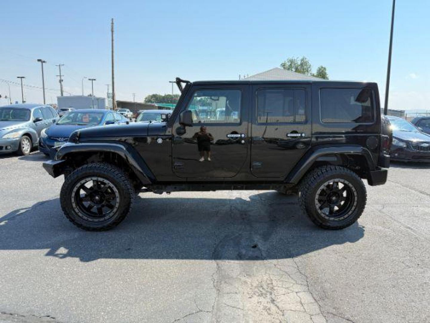 2013 BLACK /CLOTH Jeep Wrangler Unlimited (1C4HJWEG7DL) with an V6 engine, Automatic transmission, located at 1175 N Woodruff Ave, Idaho Falls, ID, 83401, 43.506901, -111.999657 - At Timberline Auto, finding a great deal on your next vehicle is always easy! Our experienced sales staff's goal is to help find you the right vehicle at the right price! Our knowledgeable finance department has options for almost any credit score. We offer extended service contract options to prote - Photo#23