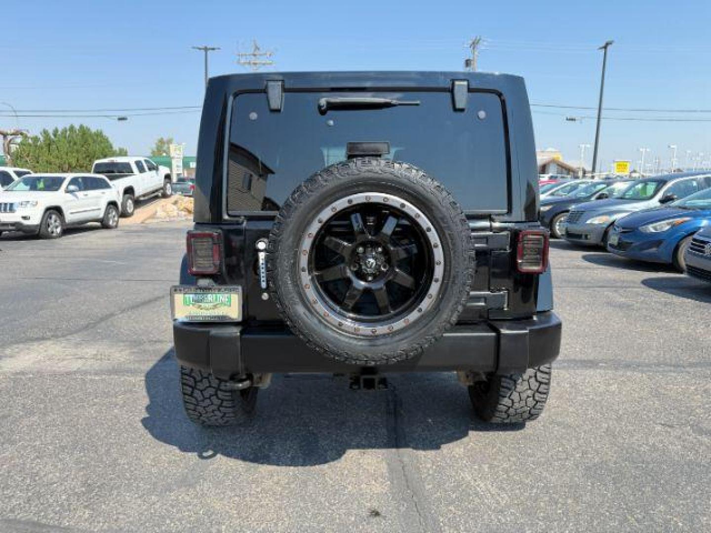 2013 BLACK /CLOTH Jeep Wrangler Unlimited (1C4HJWEG7DL) with an V6 engine, Automatic transmission, located at 1175 N Woodruff Ave, Idaho Falls, ID, 83401, 43.506901, -111.999657 - At Timberline Auto, finding a great deal on your next vehicle is always easy! Our experienced sales staff's goal is to help find you the right vehicle at the right price! Our knowledgeable finance department has options for almost any credit score. We offer extended service contract options to prote - Photo#25