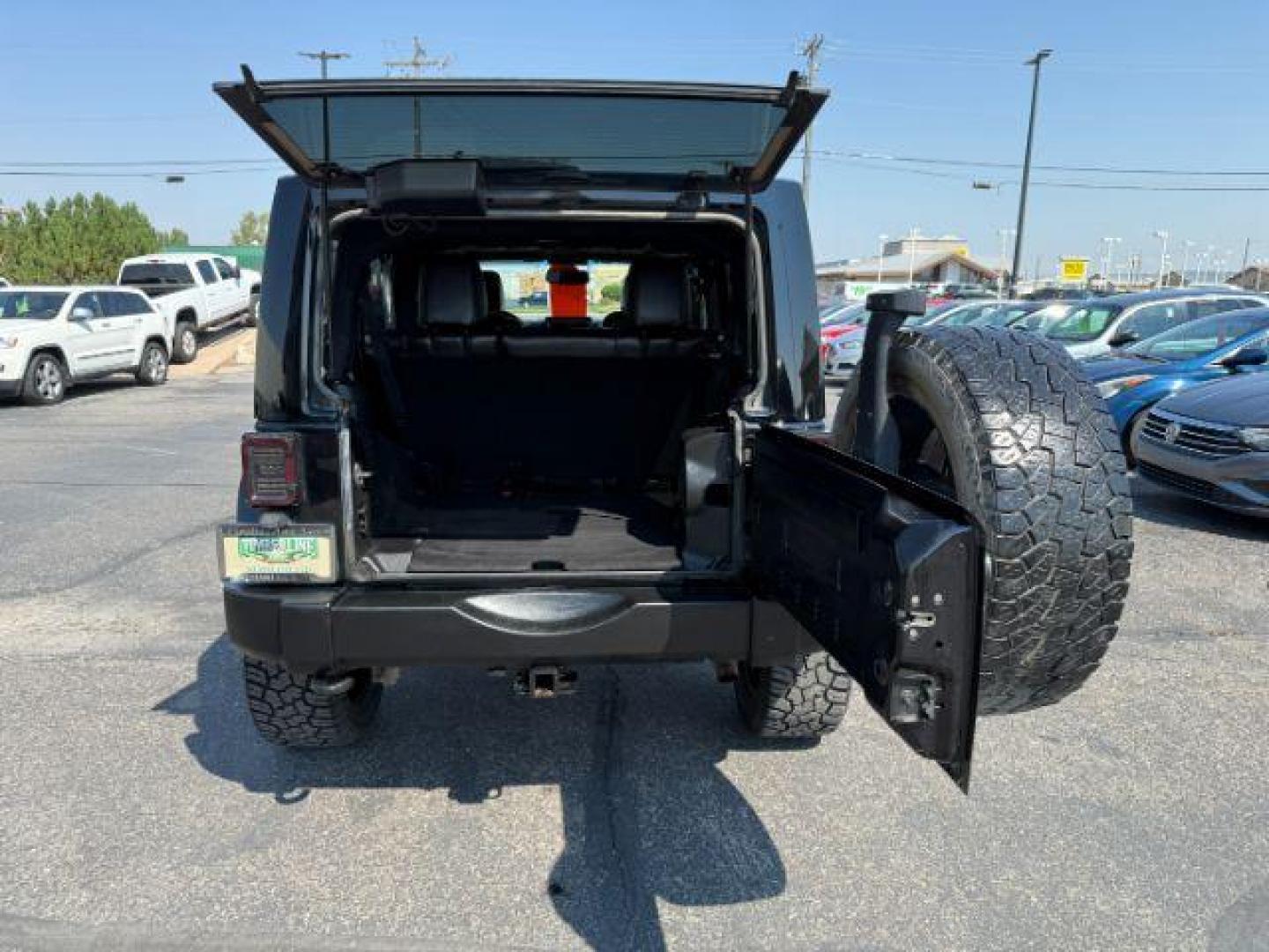 2013 BLACK /CLOTH Jeep Wrangler Unlimited (1C4HJWEG7DL) with an V6 engine, Automatic transmission, located at 1175 N Woodruff Ave, Idaho Falls, ID, 83401, 43.506901, -111.999657 - At Timberline Auto, finding a great deal on your next vehicle is always easy! Our experienced sales staff's goal is to help find you the right vehicle at the right price! Our knowledgeable finance department has options for almost any credit score. We offer extended service contract options to prote - Photo#26