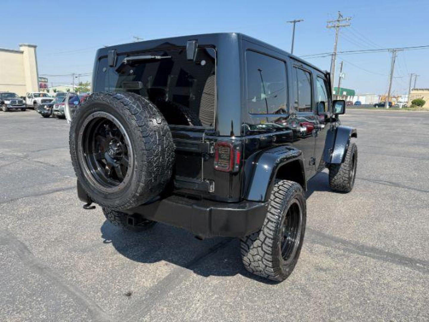 2013 BLACK /CLOTH Jeep Wrangler Unlimited (1C4HJWEG7DL) with an V6 engine, Automatic transmission, located at 1175 N Woodruff Ave, Idaho Falls, ID, 83401, 43.506901, -111.999657 - At Timberline Auto, finding a great deal on your next vehicle is always easy! Our experienced sales staff's goal is to help find you the right vehicle at the right price! Our knowledgeable finance department has options for almost any credit score. We offer extended service contract options to prote - Photo#27