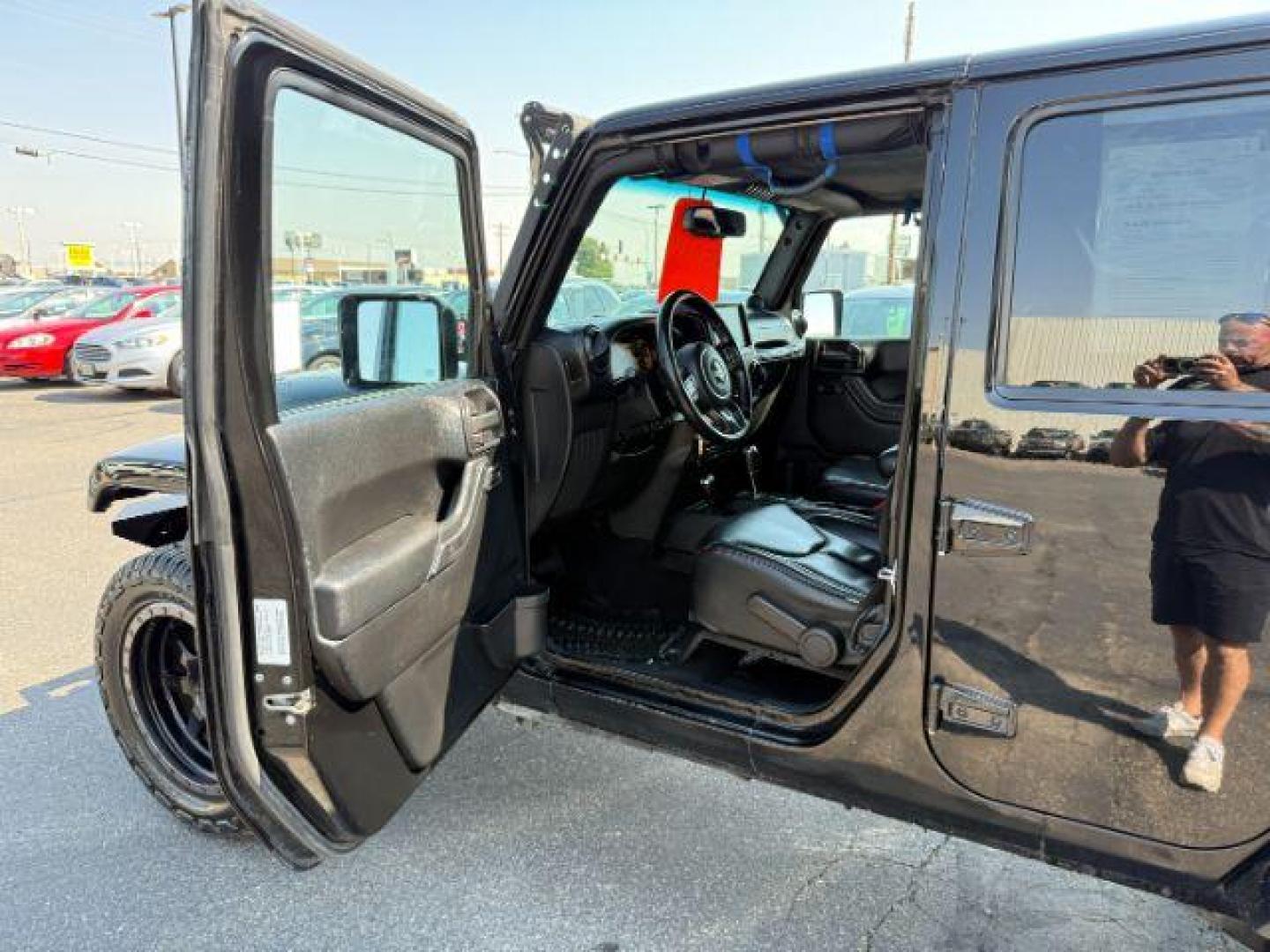 2013 BLACK /CLOTH Jeep Wrangler Unlimited (1C4HJWEG7DL) with an V6 engine, Automatic transmission, located at 1175 N Woodruff Ave, Idaho Falls, ID, 83401, 43.506901, -111.999657 - At Timberline Auto, finding a great deal on your next vehicle is always easy! Our experienced sales staff's goal is to help find you the right vehicle at the right price! Our knowledgeable finance department has options for almost any credit score. We offer extended service contract options to prote - Photo#33