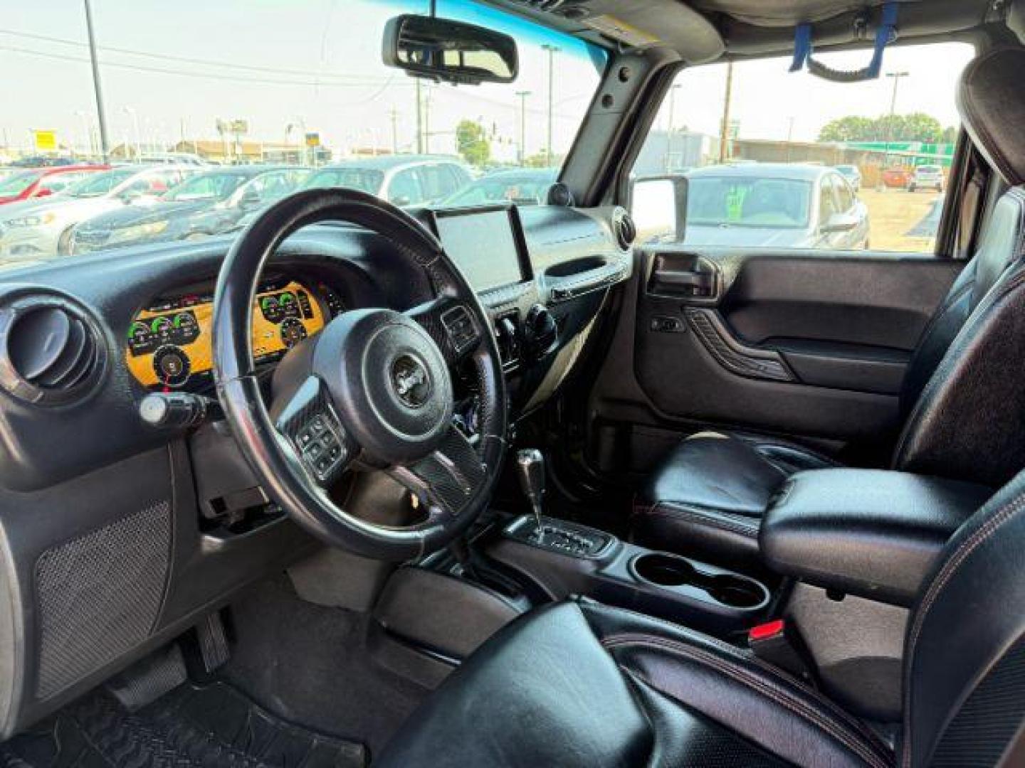2013 BLACK /CLOTH Jeep Wrangler Unlimited (1C4HJWEG7DL) with an V6 engine, Automatic transmission, located at 1175 N Woodruff Ave, Idaho Falls, ID, 83401, 43.506901, -111.999657 - At Timberline Auto, finding a great deal on your next vehicle is always easy! Our experienced sales staff's goal is to help find you the right vehicle at the right price! Our knowledgeable finance department has options for almost any credit score. We offer extended service contract options to prote - Photo#35
