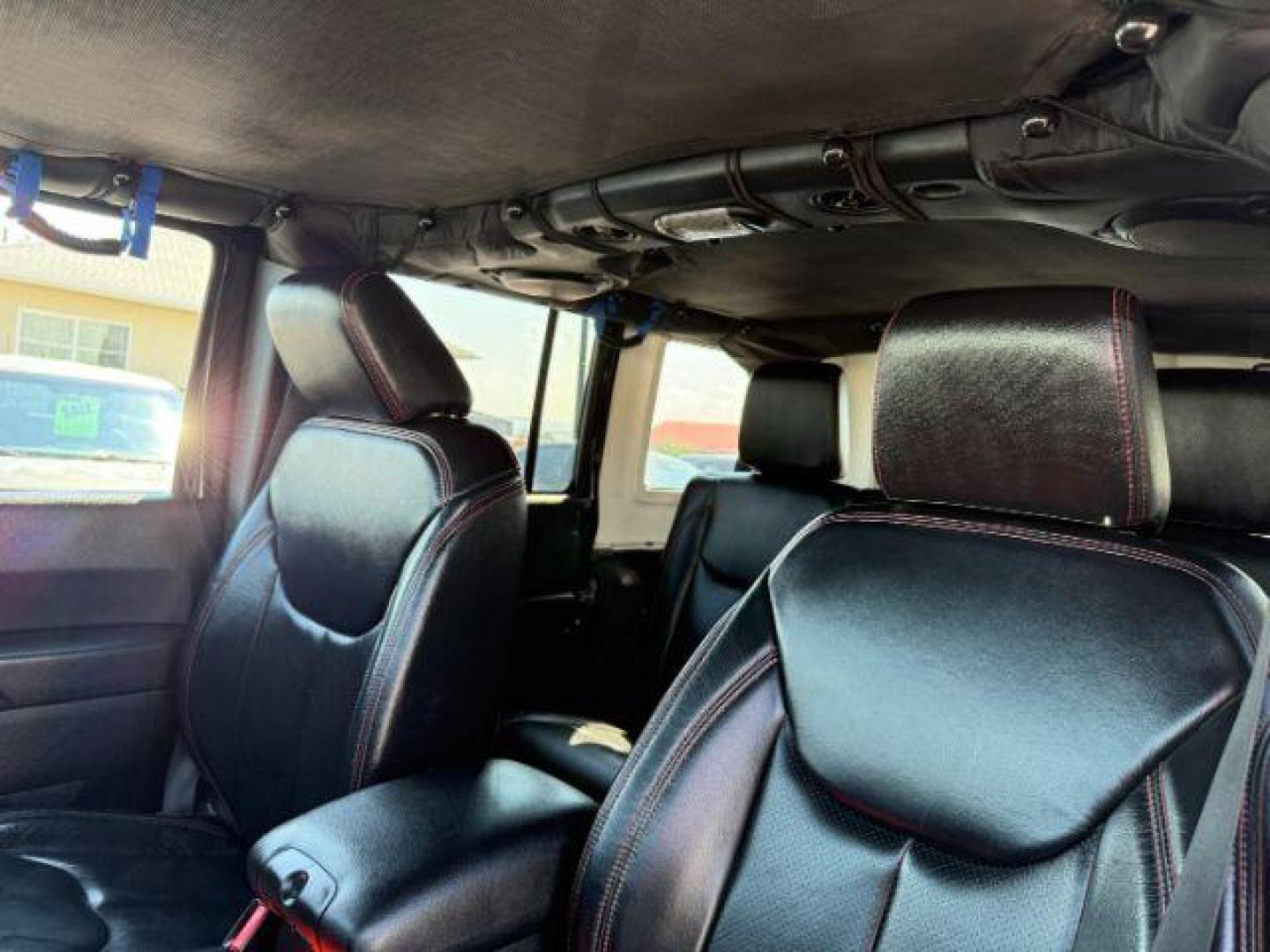 2013 BLACK /CLOTH Jeep Wrangler Unlimited (1C4HJWEG7DL) with an V6 engine, Automatic transmission, located at 1175 N Woodruff Ave, Idaho Falls, ID, 83401, 43.506901, -111.999657 - At Timberline Auto, finding a great deal on your next vehicle is always easy! Our experienced sales staff's goal is to help find you the right vehicle at the right price! Our knowledgeable finance department has options for almost any credit score. We offer extended service contract options to prote - Photo#39