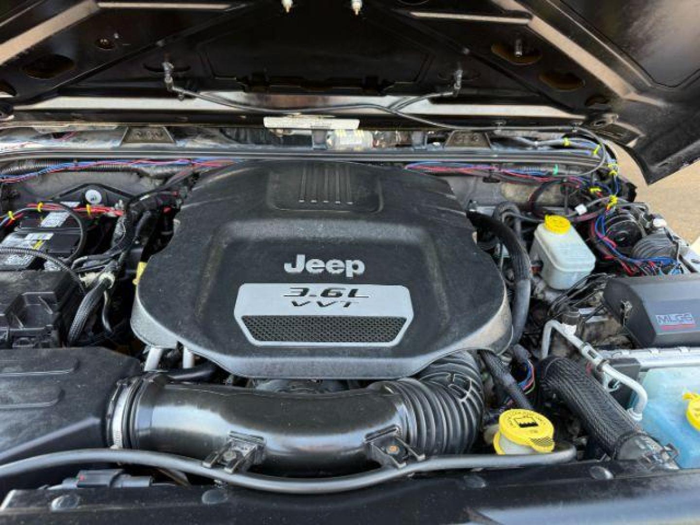 2013 BLACK /CLOTH Jeep Wrangler Unlimited (1C4HJWEG7DL) with an V6 engine, Automatic transmission, located at 1175 N Woodruff Ave, Idaho Falls, ID, 83401, 43.506901, -111.999657 - At Timberline Auto, finding a great deal on your next vehicle is always easy! Our experienced sales staff's goal is to help find you the right vehicle at the right price! Our knowledgeable finance department has options for almost any credit score. We offer extended service contract options to prote - Photo#43