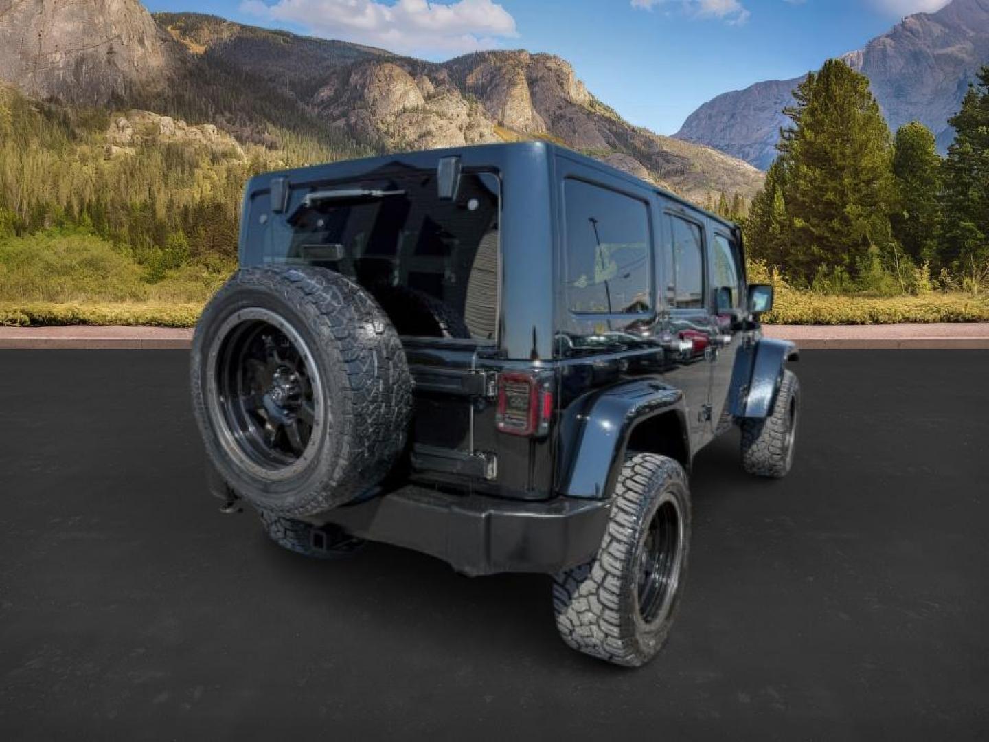 2013 BLACK /CLOTH Jeep Wrangler Unlimited (1C4HJWEG7DL) with an V6 engine, Automatic transmission, located at 1175 N Woodruff Ave, Idaho Falls, ID, 83401, 43.506901, -111.999657 - At Timberline Auto, finding a great deal on your next vehicle is always easy! Our experienced sales staff's goal is to help find you the right vehicle at the right price! Our knowledgeable finance department has options for almost any credit score. We offer extended service contract options to prote - Photo#5
