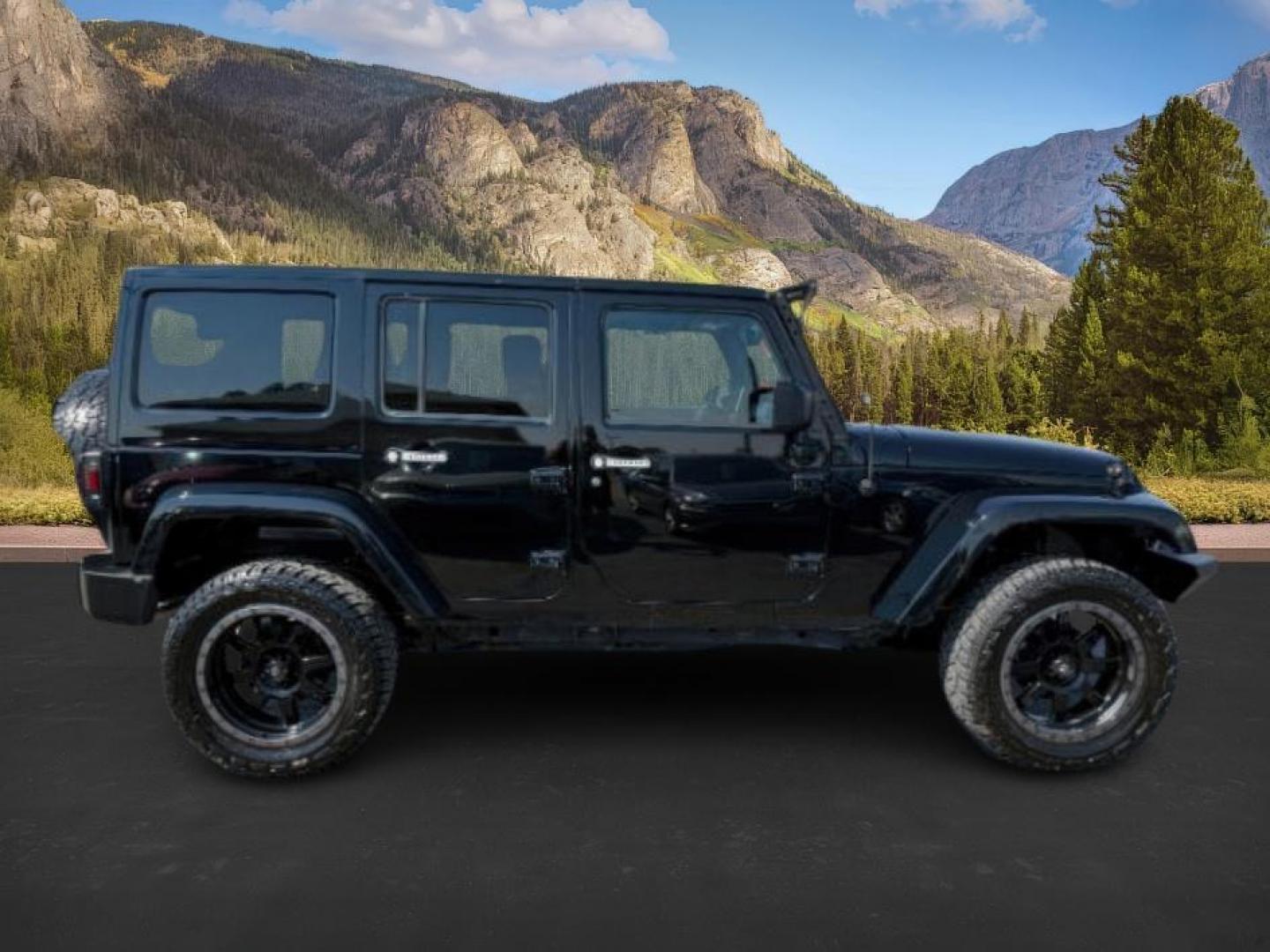 2013 BLACK /CLOTH Jeep Wrangler Unlimited (1C4HJWEG7DL) with an V6 engine, Automatic transmission, located at 1175 N Woodruff Ave, Idaho Falls, ID, 83401, 43.506901, -111.999657 - At Timberline Auto, finding a great deal on your next vehicle is always easy! Our experienced sales staff's goal is to help find you the right vehicle at the right price! Our knowledgeable finance department has options for almost any credit score. We offer extended service contract options to prote - Photo#6