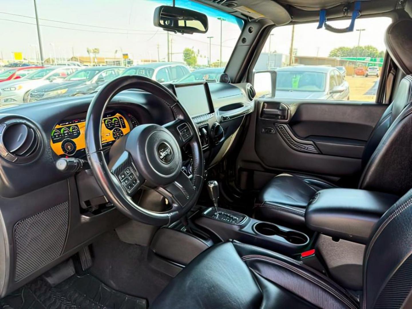 2013 BLACK /CLOTH Jeep Wrangler Unlimited (1C4HJWEG7DL) with an V6 engine, Automatic transmission, located at 1175 N Woodruff Ave, Idaho Falls, ID, 83401, 43.506901, -111.999657 - At Timberline Auto, finding a great deal on your next vehicle is always easy! Our experienced sales staff's goal is to help find you the right vehicle at the right price! Our knowledgeable finance department has options for almost any credit score. We offer extended service contract options to prote - Photo#13