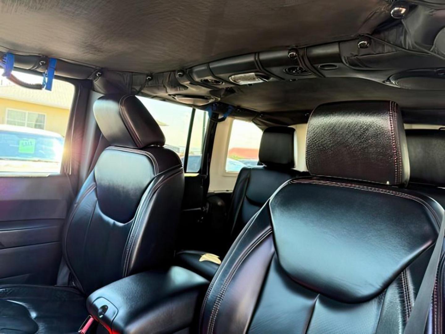 2013 BLACK /CLOTH Jeep Wrangler Unlimited (1C4HJWEG7DL) with an V6 engine, Automatic transmission, located at 1175 N Woodruff Ave, Idaho Falls, ID, 83401, 43.506901, -111.999657 - At Timberline Auto, finding a great deal on your next vehicle is always easy! Our experienced sales staff's goal is to help find you the right vehicle at the right price! Our knowledgeable finance department has options for almost any credit score. We offer extended service contract options to prote - Photo#17