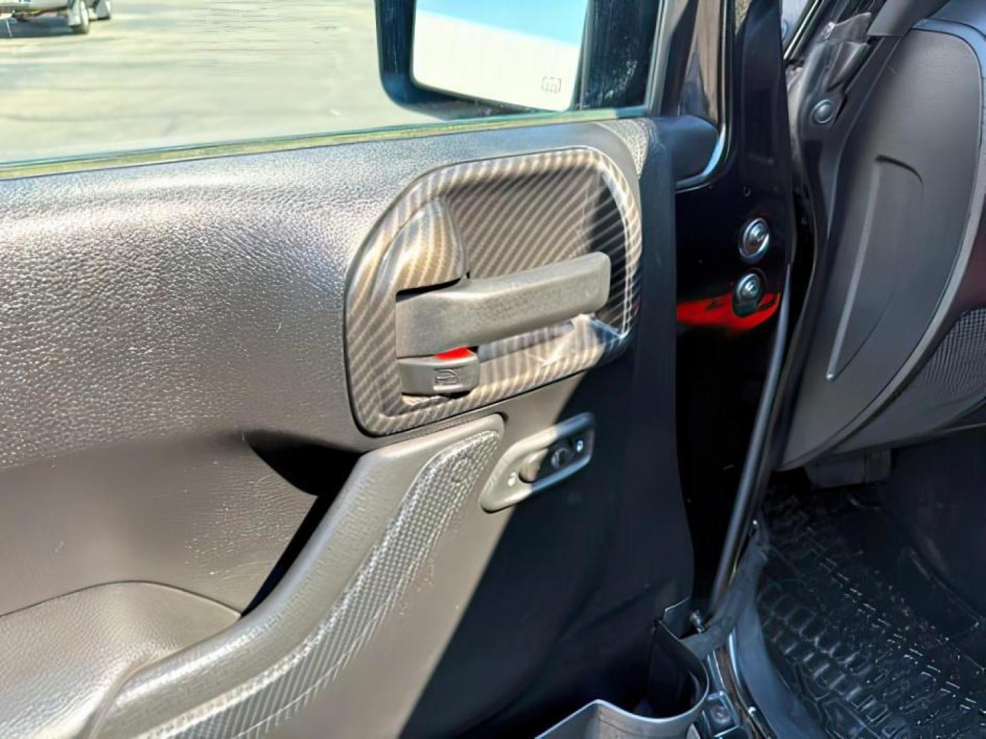 2013 BLACK /CLOTH Jeep Wrangler Unlimited (1C4HJWEG7DL) with an V6 engine, Automatic transmission, located at 1175 N Woodruff Ave, Idaho Falls, ID, 83401, 43.506901, -111.999657 - At Timberline Auto, finding a great deal on your next vehicle is always easy! Our experienced sales staff's goal is to help find you the right vehicle at the right price! Our knowledgeable finance department has options for almost any credit score. We offer extended service contract options to prote - Photo#18