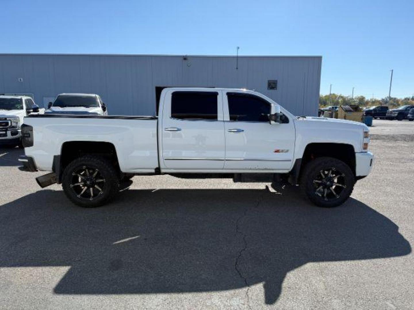 2016 WHITE /LEATHER Chevrolet Silverado 3500HD (1GC4K0C81GF) with an 66 engine, Automatic transmission, located at 1175 N Woodruff Ave, Idaho Falls, ID, 83401, 43.506901, -111.999657 - At Timberline Auto, finding a great deal on your next vehicle is always easy! Our experienced sales staff's goal is to help find you the right vehicle at the right price! Our knowledgeable finance department has options for almost any credit score. We offer extended service contract options to prote - Photo#30