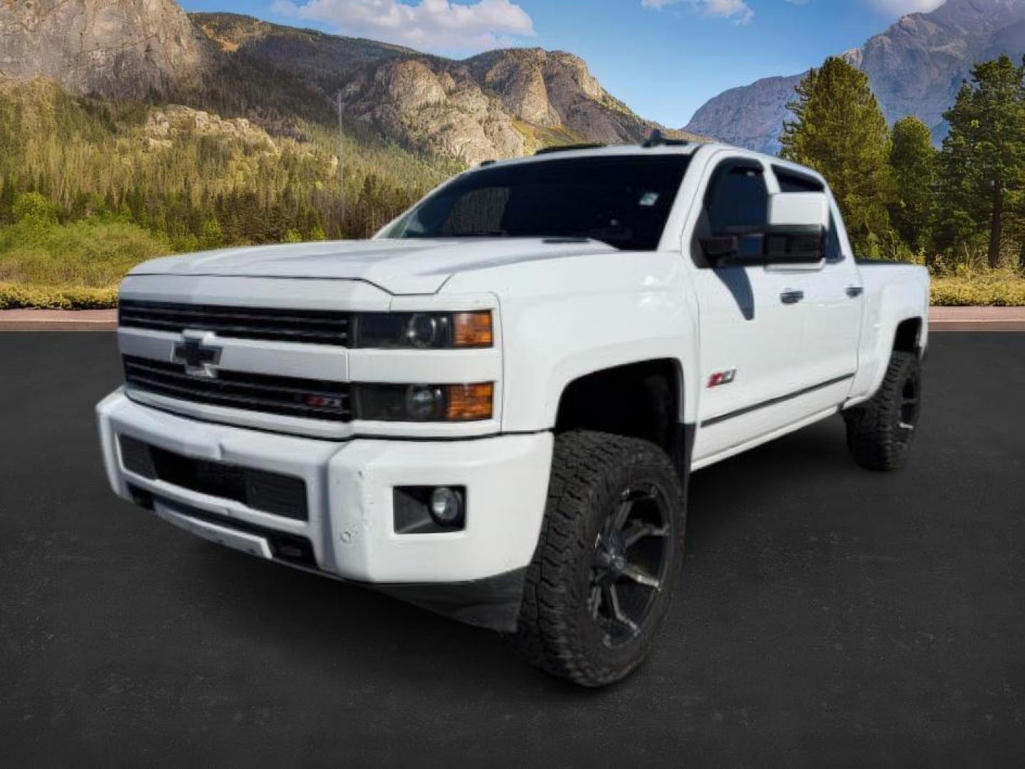 2016 WHITE /LEATHER Chevrolet Silverado 3500HD (1GC4K0C81GF) with an 66 engine, Automatic transmission, located at 1175 N Woodruff Ave, Idaho Falls, ID, 83401, 43.506901, -111.999657 - At Timberline Auto, finding a great deal on your next vehicle is always easy! Our experienced sales staff's goal is to help find you the right vehicle at the right price! Our knowledgeable finance department has options for almost any credit score. We offer extended service contract options to prote - Photo#0