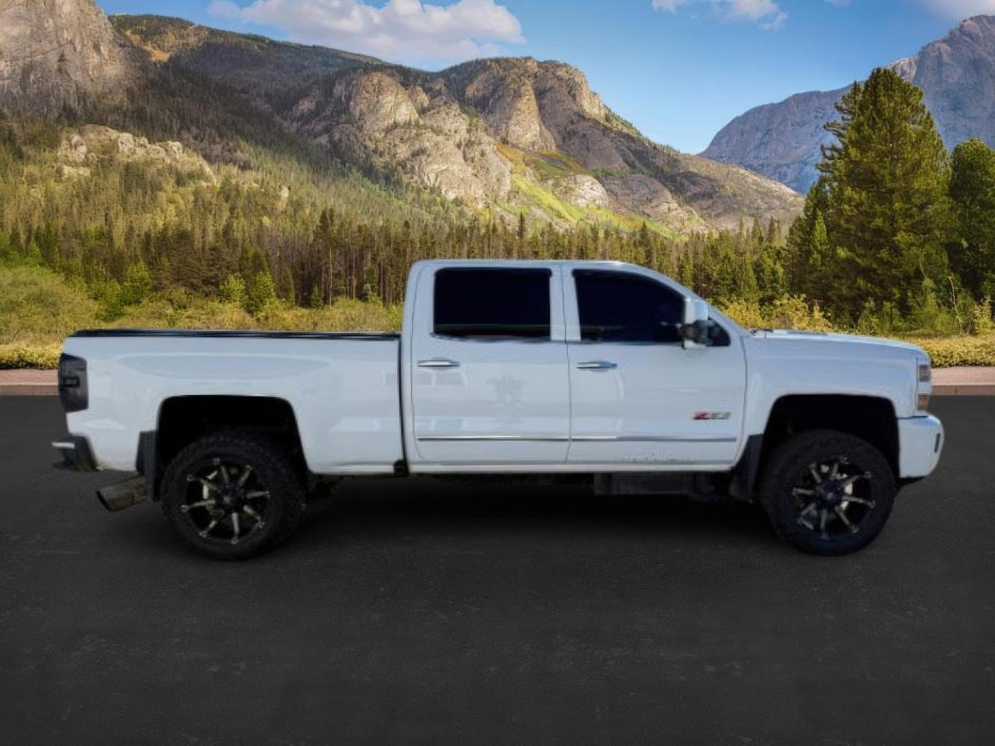 2016 WHITE /LEATHER Chevrolet Silverado 3500HD (1GC4K0C81GF) with an 66 engine, Automatic transmission, located at 1175 N Woodruff Ave, Idaho Falls, ID, 83401, 43.506901, -111.999657 - At Timberline Auto, finding a great deal on your next vehicle is always easy! Our experienced sales staff's goal is to help find you the right vehicle at the right price! Our knowledgeable finance department has options for almost any credit score. We offer extended service contract options to prote - Photo#6