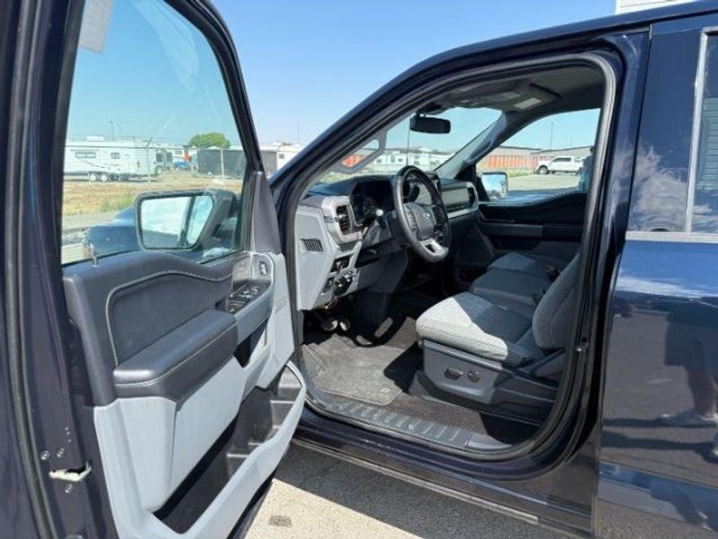2023 Antimatter Blue Metallic /Black w/Medium Dark Slate Ford F-150 XLT (1FTFW1E53PK) with an V8, 5.0L engine, 10-speed automatic transmission, located at 1175 N Woodruff Ave, Idaho Falls, ID, 83401, 43.506901, -111.999657 - <b>Vehicle Details</b><br>This pre-owned 2023 Ford F-150 XLT is a standout pickup truck for drivers who want proven capability, modern comfort, and legendary Ford toughness. With only 37,317 miles, this Ford F-150 has plenty of road ahead and is ready to handle your next job, weekend project, or adv- Photo#10