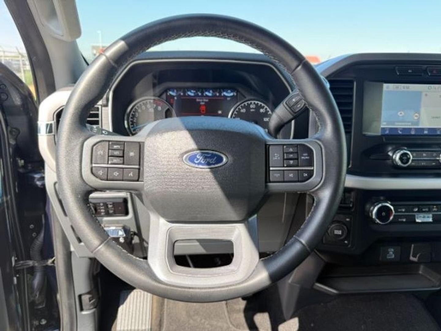 2023 Antimatter Blue Metallic /Black w/Medium Dark Slate Ford F-150 XLT (1FTFW1E53PK) with an V8, 5.0L engine, 10-speed automatic transmission, located at 1175 N Woodruff Ave, Idaho Falls, ID, 83401, 43.506901, -111.999657 - <b>Vehicle Details</b><br>This pre-owned 2023 Ford F-150 XLT is a standout pickup truck for drivers who want proven capability, modern comfort, and legendary Ford toughness. With only 37,317 miles, this Ford F-150 has plenty of road ahead and is ready to handle your next job, weekend project, or adv- Photo#13