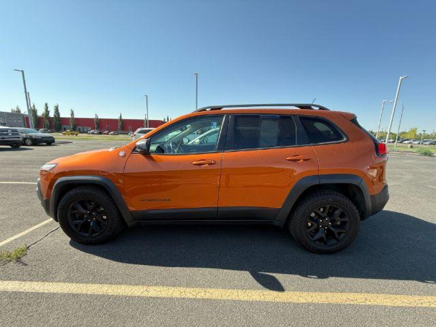 2015 ORANGE /CLOTH Jeep CHEROKEE (1C4PJMBS2FW) with an 32 engine, Automatic transmission, located at 1175 N Woodruff Ave, Idaho Falls, ID, 83401, 43.506901, -111.999657 - At Timberline Auto, finding a great deal on your next vehicle is always easy! Our experienced sales staff's goal is to help find you the right vehicle at the right price! Our knowledgeable finance department has options for almost any credit score. We offer extended service contract options to prote - Photo#1